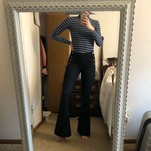 Mid rise dark flare jeans with stretch